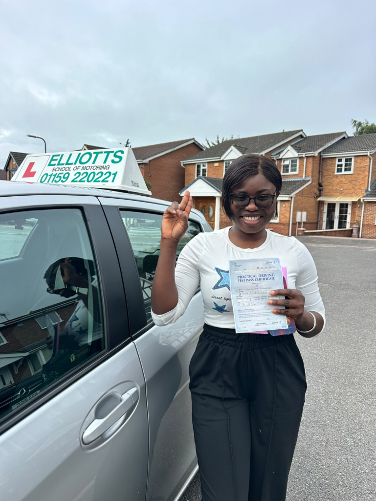 Esther passing their driving test with Elliotts School of Motoring