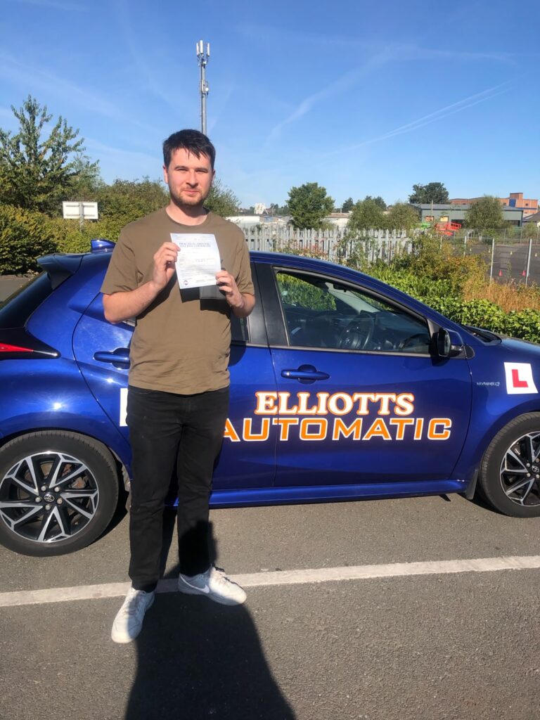 Jake passing their driving test with Elliotts School of Motoring